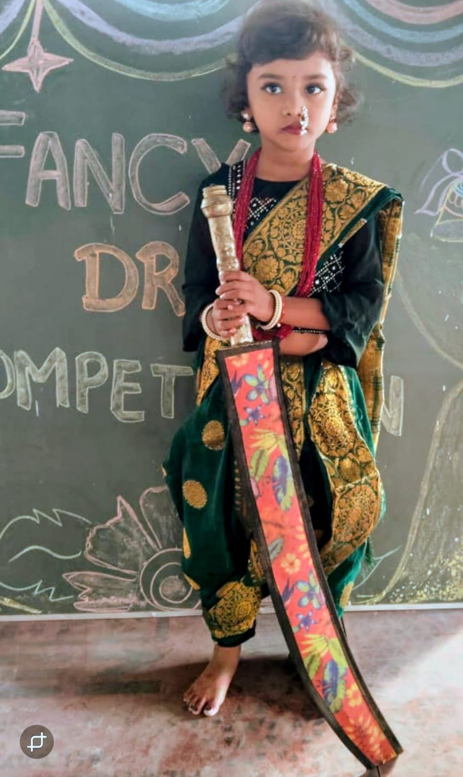 Girl dressed as Rani Laxmibai for competition