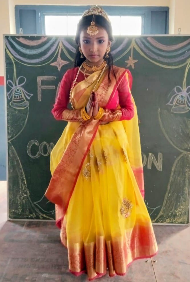Girl dressed as a traditional deity