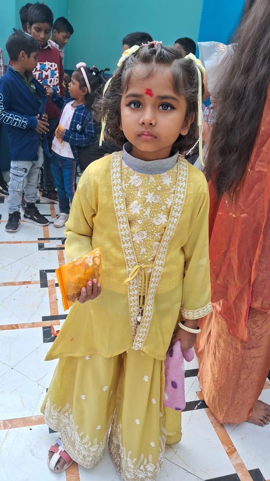 Girl in yellow ethnic attire