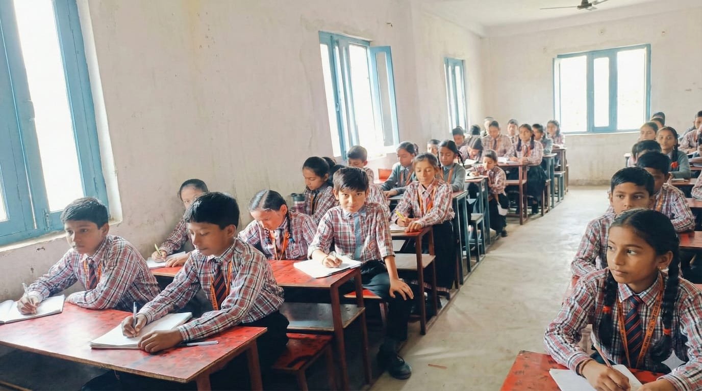 Boys and girls learning together in a classroom